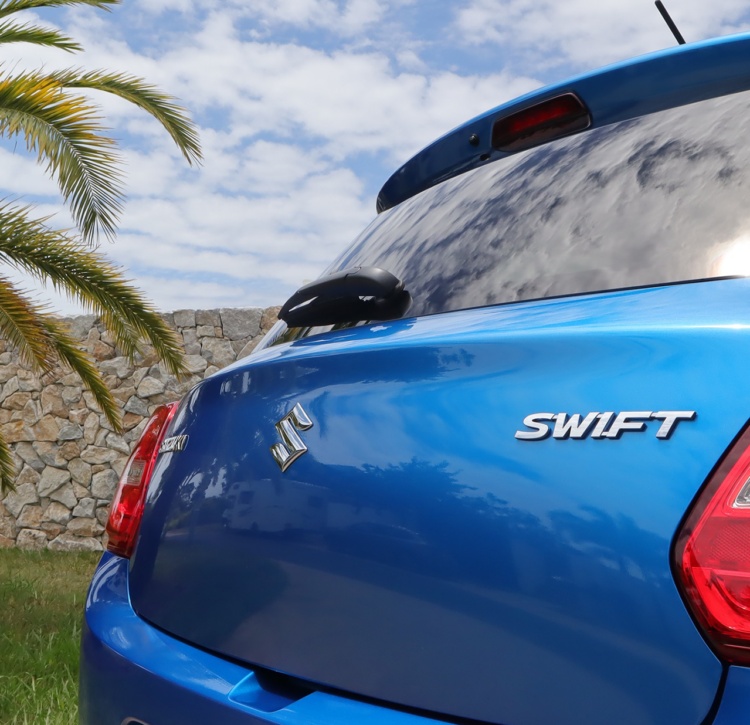 Rear angle of Swift tailgate with iconic Swift badging